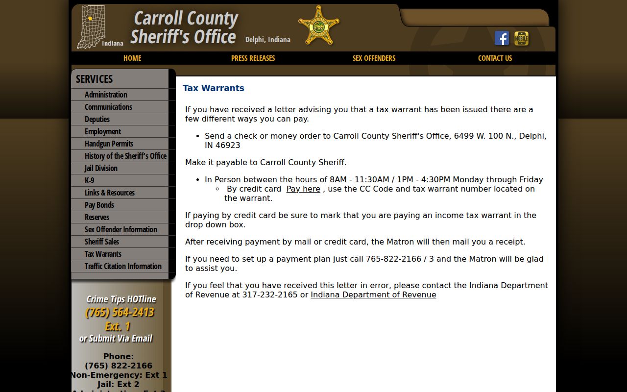 Carroll County tax warrant payment instructions distinguished from outstanding arrest warrants